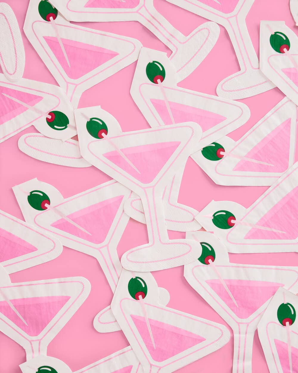 White geometric shapes with green and red accents on a pink background
